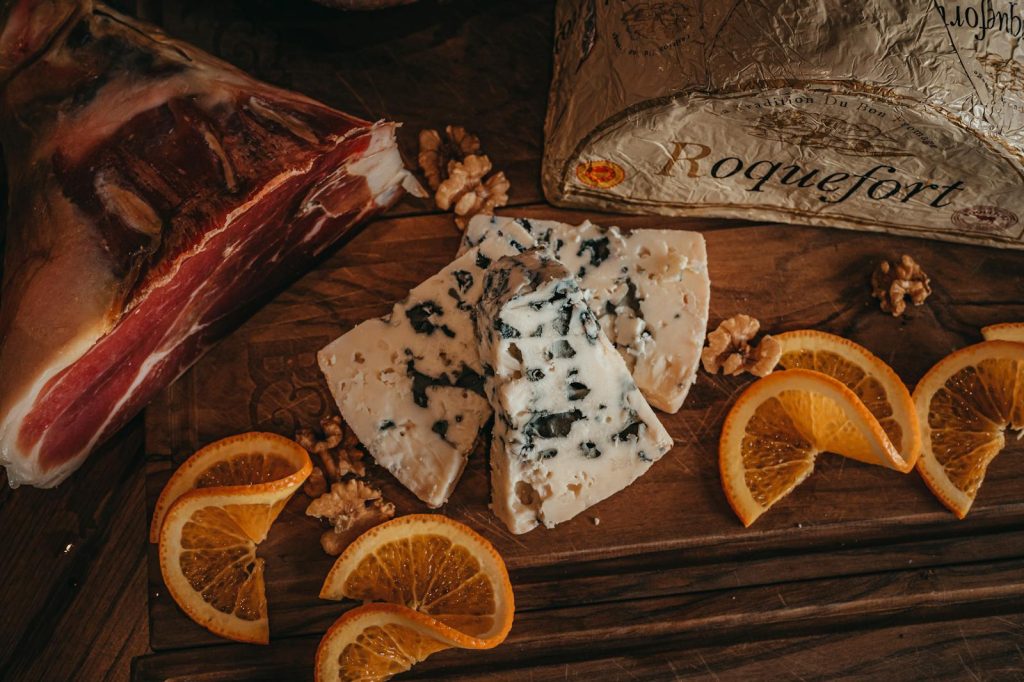 Roquefort French blue cheese with walnuts and dried orange